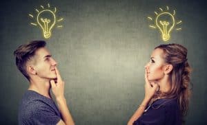 Couple thinking with idea lightbulbs