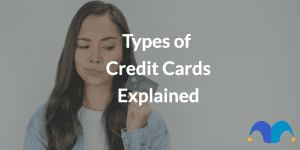 An image of a woman holding a credit card with the text "Types of Credit Cards Explained" and The Motley Fool UK's jester cap logo.