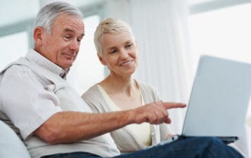 Elderly Couple Review Holdings