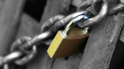 Padlocked wooden door