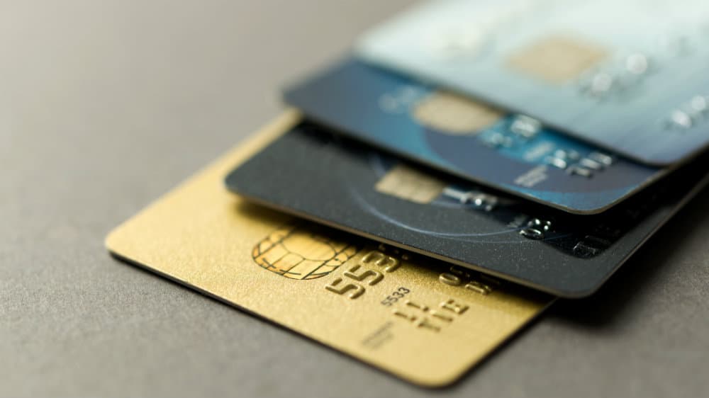Close up of credit cards over grey background