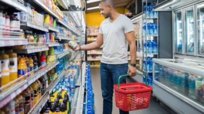 Man shopping in supermarket