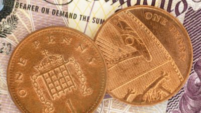 British Pennies on a Pound Note