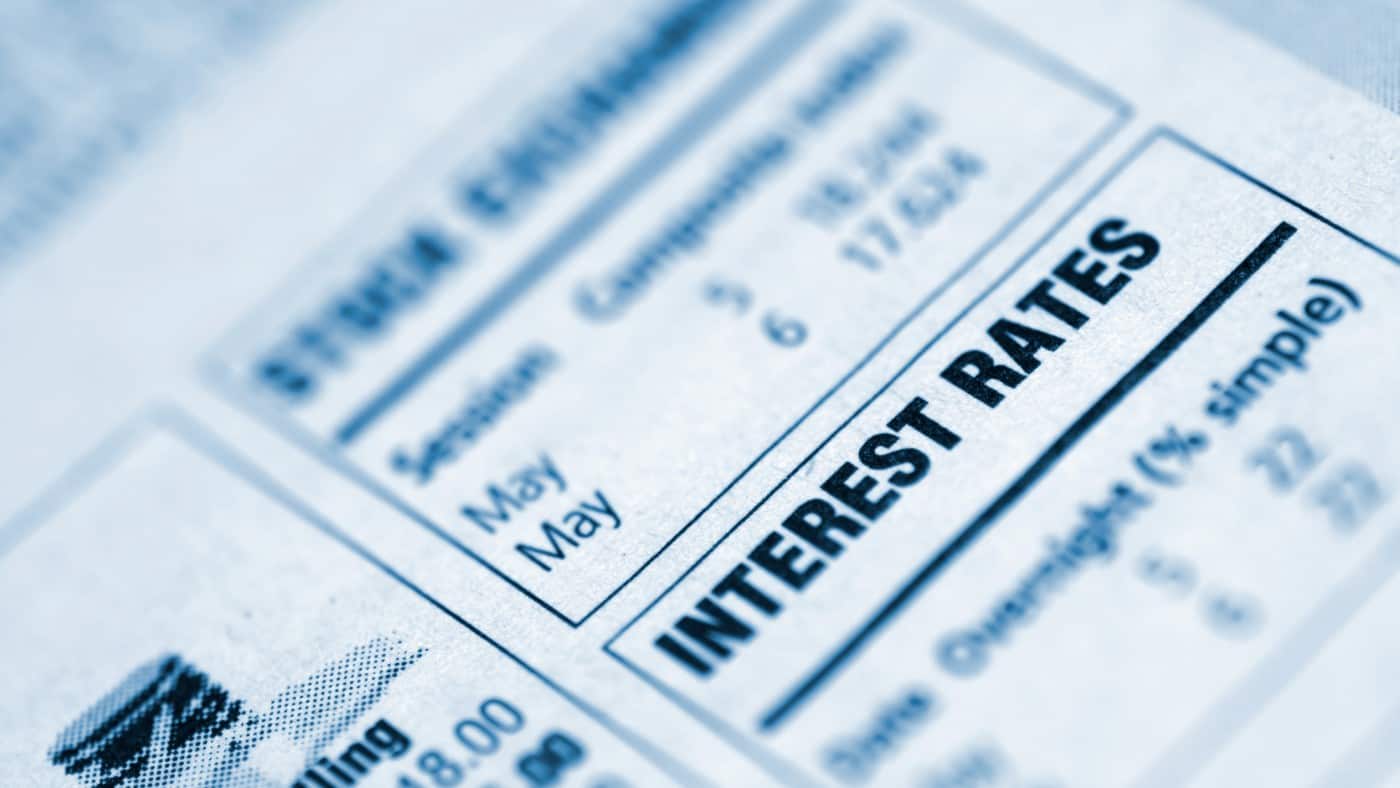Closeup of "interest rates" text in a newspaper