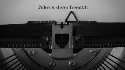 Text that reads Take a deep breath typed on retro typewriter