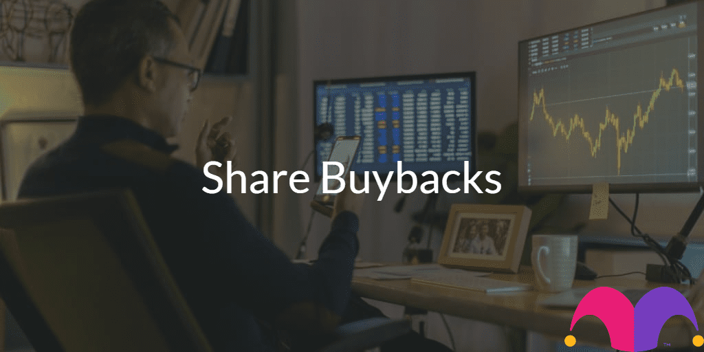Person in front of the computer with the text "Share Buybacks" and the Motley Fool Logo