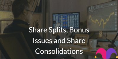 Person in front of the computer with the text "Share Splits, Bonus Issues and Share Consolidations" and the Motley Fool Logo