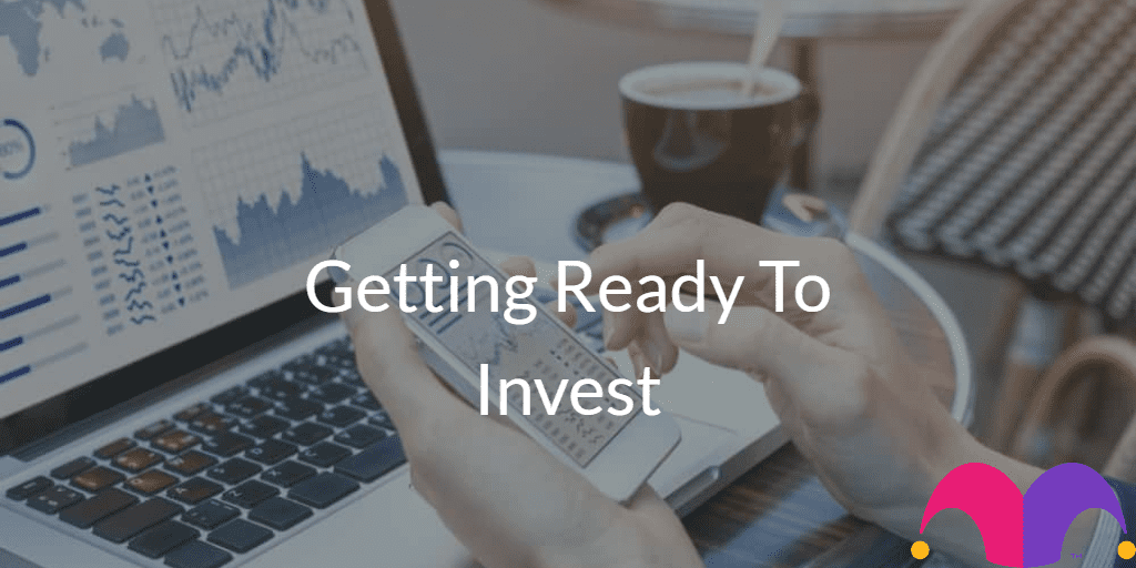 Person showing phone screen with the text "Getting Ready To Invest" and the Motley Fool Logo