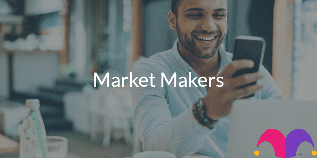 Man looking at a mobile phone with the text "Market Makers" and the Motley Fool Logo