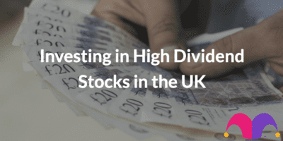 A photo of hands holding dividend payments with the text "Investing in High Dividend Stocks in the UK" and The Motley Fool jester cap overlaid on top.