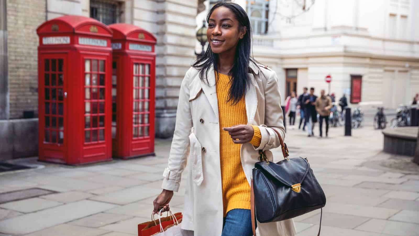 Young black woman walking in Central London for shopping