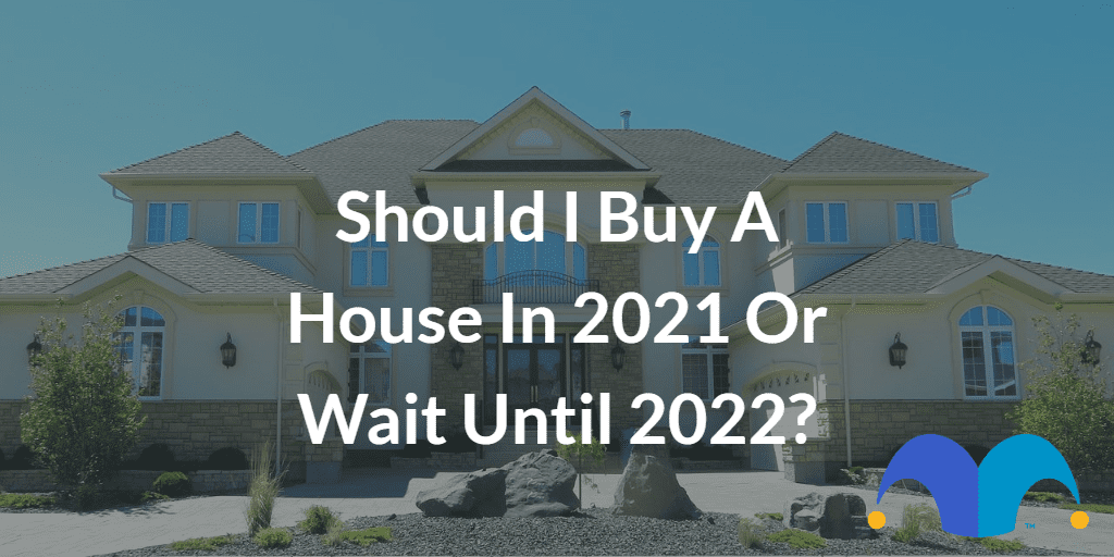 Large home with the text “Should I buy a house in 2021 or wait until 2022?” and The Motley Fool jester cap logo