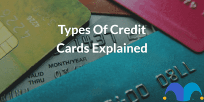 Stack of credit cards with the text “Types of credit cards explained” and The Motley Fool jester cap logo