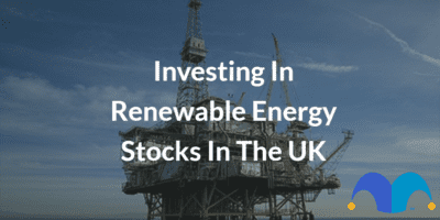 Oil Rig with the text “Investing In Renewable Energy Stocks In The UK” and The Motley Fool jester cap logo