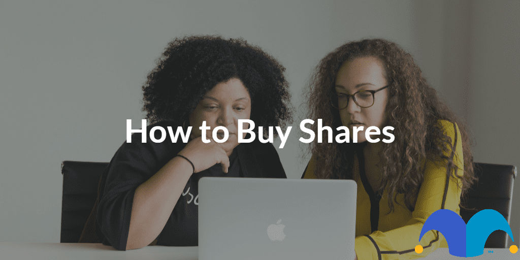 Two women working on laptop with the text “How to Buy Shares” and The Motley Fool jester cap logo