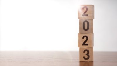 New year '2023' numbers on stacked wooden cubes