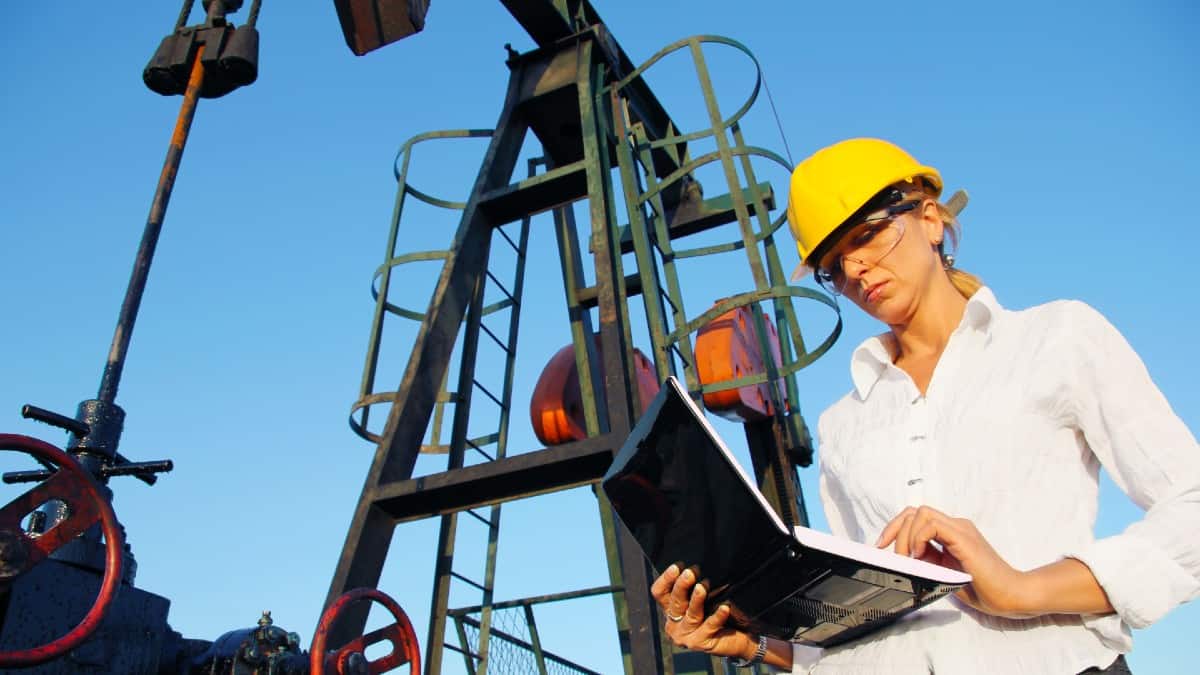 White female supervisor working at an oil rig
