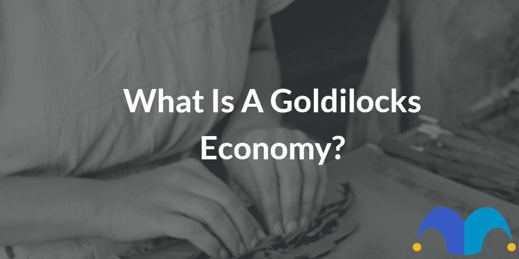 Workers hands with the text “What is a Goldilocks economy?” and The Motley Fool jester cap logo