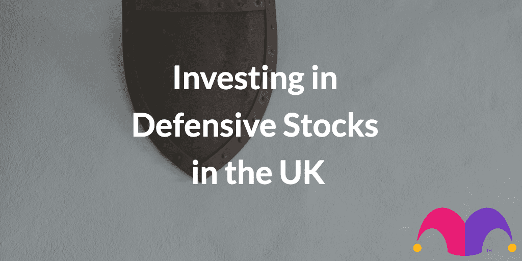 An image of a shield with the text, "Investing in Defensive Stocks in the UK"