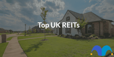 Image of suburban Home with the text “Top UK reits” and The Motley Fool jester cap logo