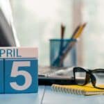 Calendar showing the date of 5th April on desk in a house