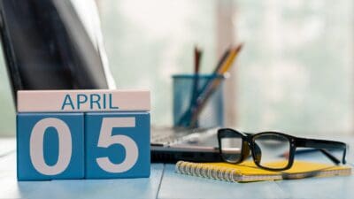 Calendar showing the date of 5th April on desk in a house