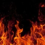 Illustration of flames over a black background
