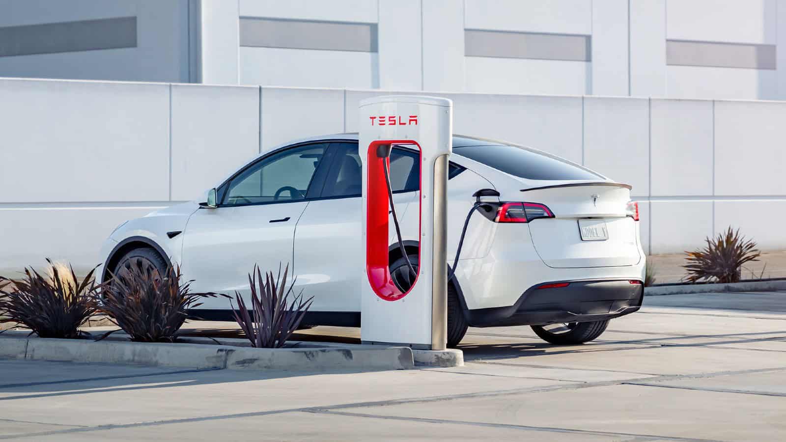Tesla car at super charger station